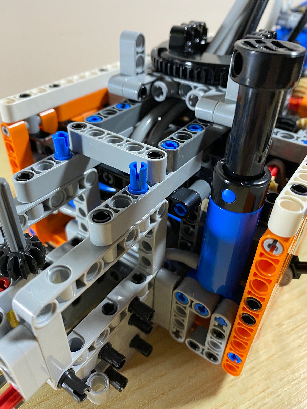 Vertical detail of gears, liftarms and actuators in a modern LEGO Technic model